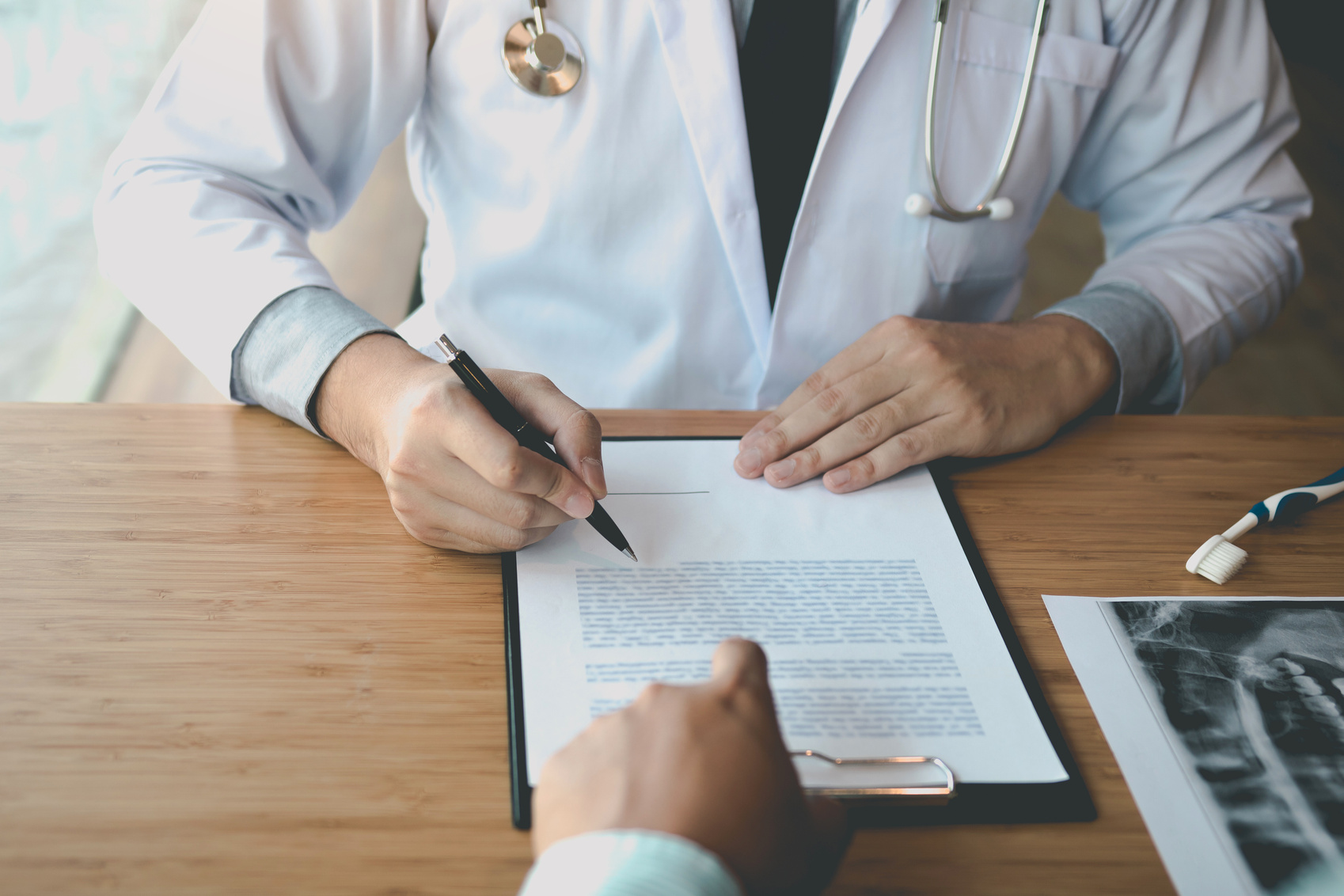 Doctor Discussing with Patient